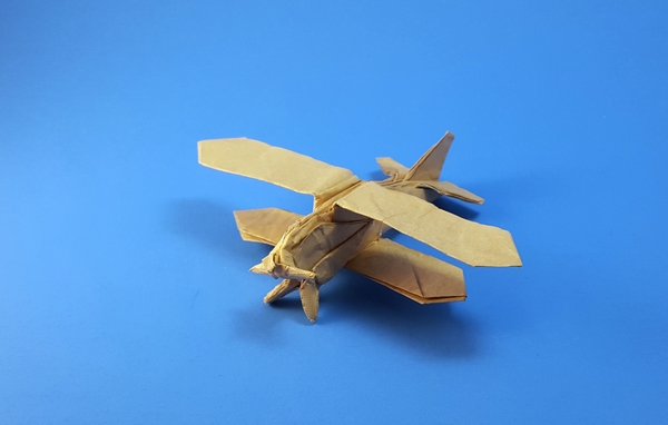 Origami Biplane by Yoshihide Momotani. Folded from a square of Kathy Stevick's tissue foil by Gilad Aharoni on giladorigami.com