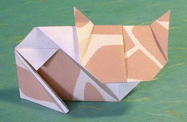 Origami Cat by Kunihiko Kasahara. Folded from a square of animal pattern origami paper by Gilad Aharoni on giladorigami.com