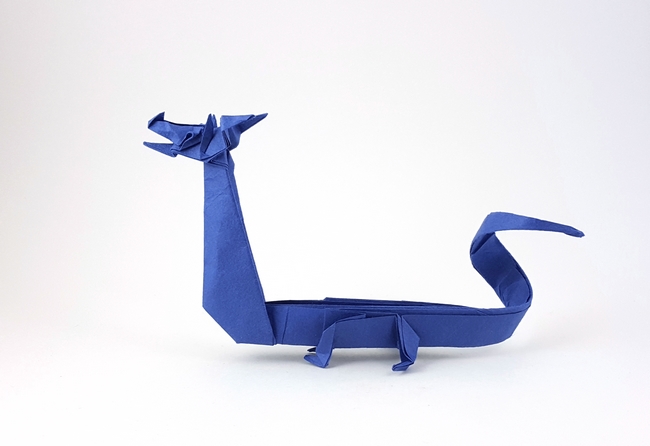 Origami Chinese dragon by John Montroll. Folded from a square of Hanji paper by Gilad Aharoni on giladorigami.com
