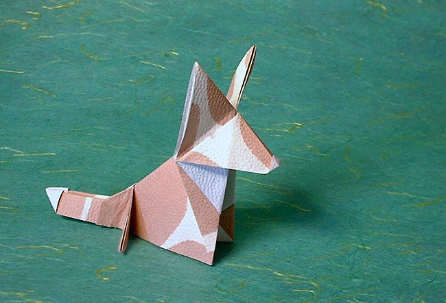 Origami Welsh Corgi by Guspath Go. Folded from a square of animal patterned paper by Gilad Aharoni on giladorigami.com