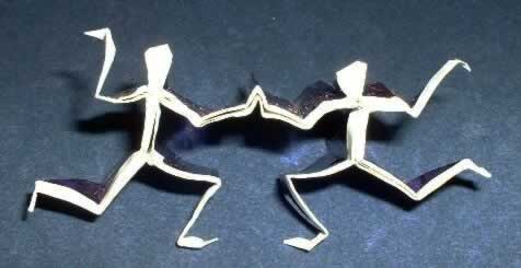Origami Dancers by Jeremy Shafer. Folded from a square of Japanese foil by Gilad Aharoni on giladorigami.com