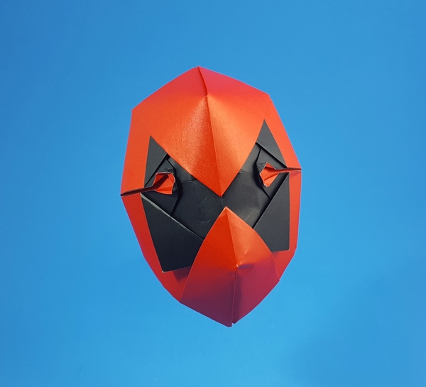 Origami Deadpool mask by Sebastien Limet (Sebl). Folded from a square of Duo origami paper by Gilad Aharoni on giladorigami.com
