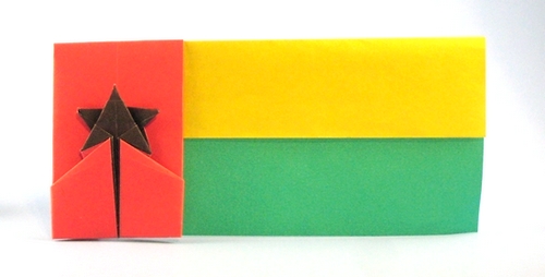 Origami Flag of Guinea Bissau by Gilad Aharoni. Folded from 2 squares of duo origami paper by Gilad Aharoni on giladorigami.com