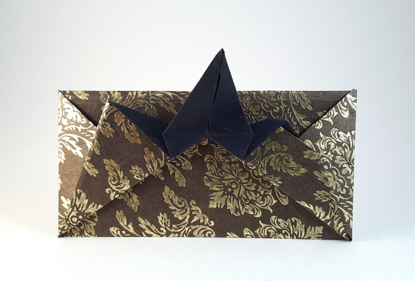 Origami Flapping bird envelope by Michael G. LaFosse. Folded from a square of hand-made paper by Gilad Aharoni on giladorigami.com