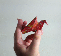 Origami Flapping bird by Traditional folded by Gilad Aharoni