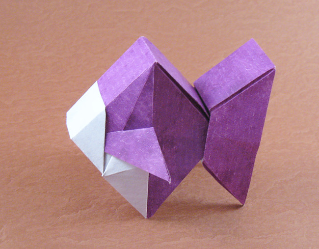 Origami Goldfish type square by Seishi Kasumi. Folded from a square of patterned origami paper by Gilad Aharoni on giladorigami.com