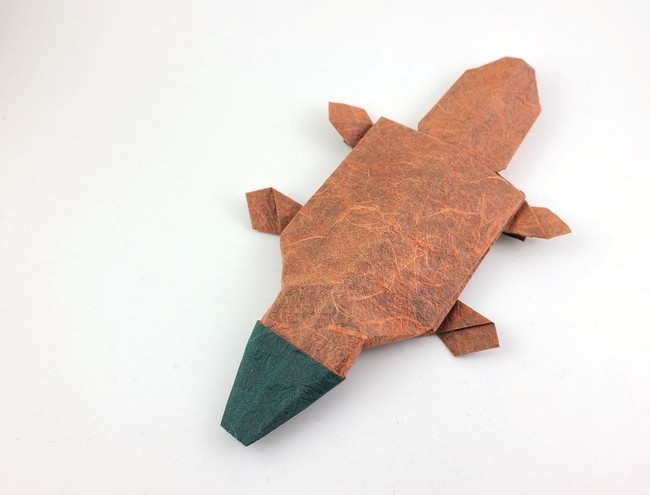 Origami Duck-billed platypus by Matsuno Yukihiko. Folded from a square of Duo Thai origami paper by Gilad Aharoni on giladorigami.com