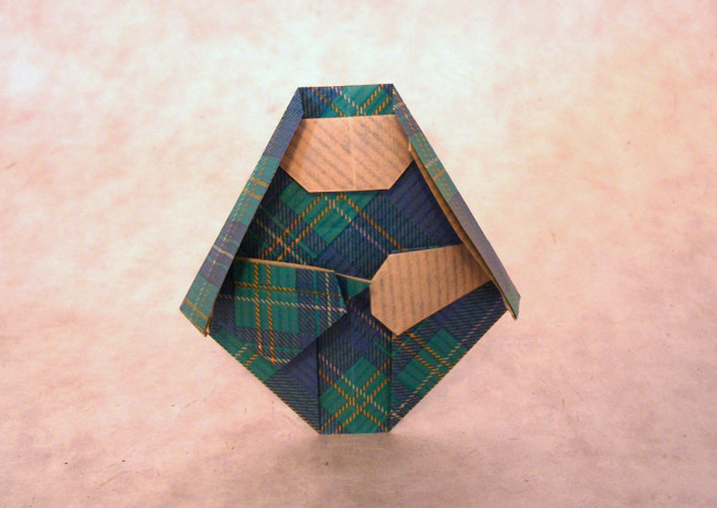 Origami Miriam with timbrel by Joel Stern. Folded from a square of Kraft origami paper by Gilad Aharoni on giladorigami.com