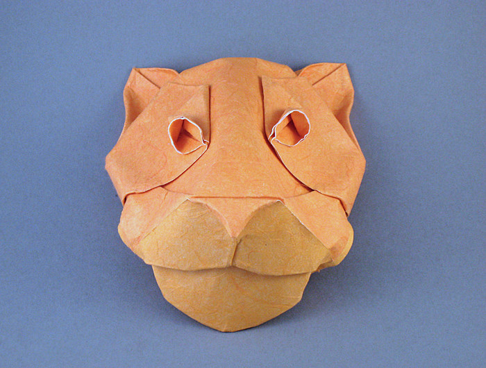Origami Panther mask by Michael G. LaFosse. Wet-folded from a square of double-sided mulberry paper by Gilad Aharoni on giladorigami.com