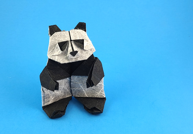 Origami Panda by Imai Yudai. Folded from a square of Duo Thai origami paper by Gilad Aharoni on giladorigami.com