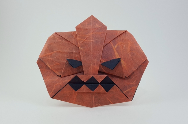 Origami Jack-o'-lantern by Takagi Hiromi. Folded from a square of duo Unryu paper by Gilad Aharoni on giladorigami.com