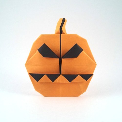 Origami Jack-o'-lantern by Edwin Steele. Folded from a square of watercolor paper by Gilad Aharoni on giladorigami.com
