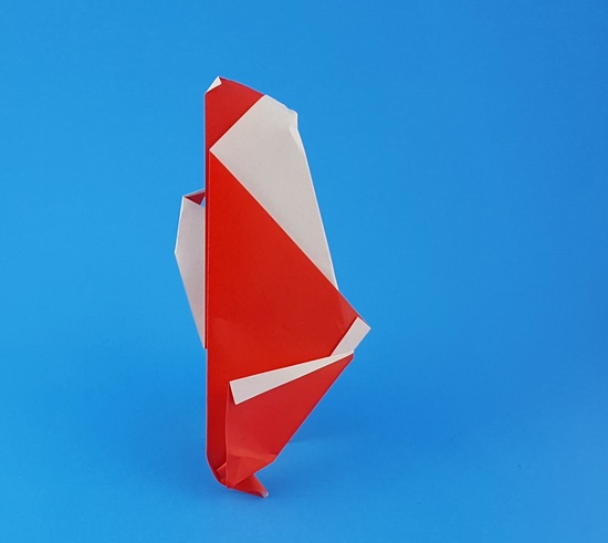Origami Santa Claus with Sack by Francesco Miglionico. Folded from a square of origami paper by Gilad Aharoni on giladorigami.com