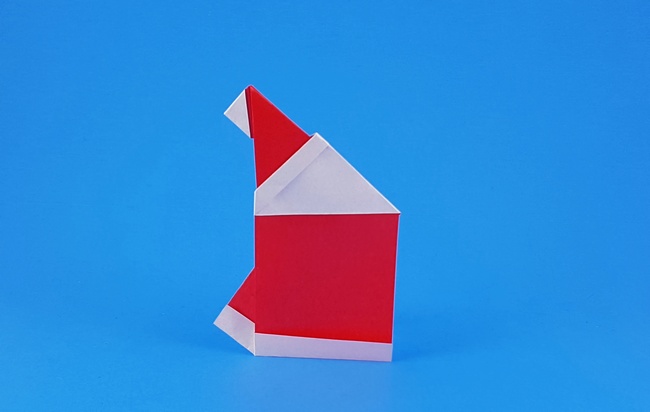 Origami Santa Claus by Francesco Miglionico. Folded from a rectangle of origami paper by Gilad Aharoni on giladorigami.com