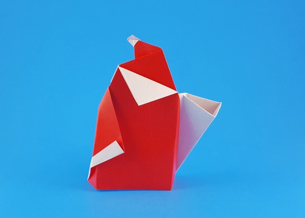 Origami Santa Claus 3 by Francesco Miglionico. Folded from a square of origami paper by Gilad Aharoni on giladorigami.com