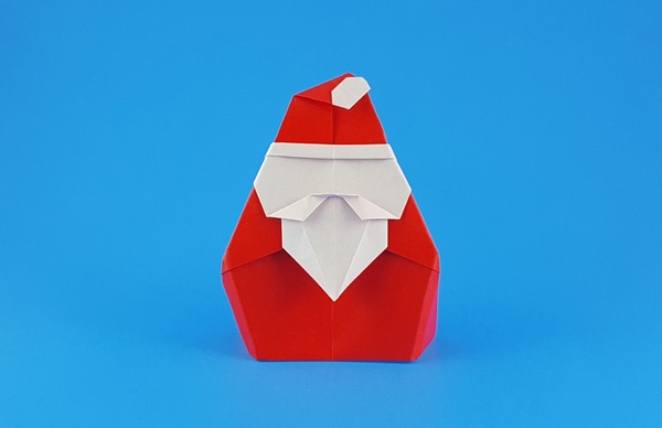 Origami Santa Claus by Francesco Miglionico. Folded from a square of origami paper by Gilad Aharoni on giladorigami.com