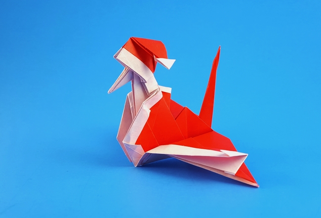 Origami Santa crane by Arisawa Yuga. Folded from a square of origami paper by Gilad Aharoni on giladorigami.com