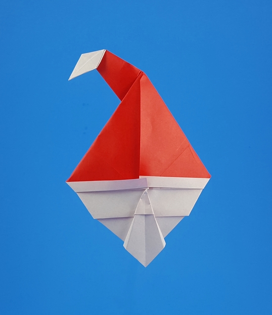 Origami Santa Claus face by Alfredo Giunta. Folded from a square of origami paper by Gilad Aharoni on giladorigami.com