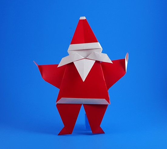 Origami Santa Claus by Takashi Irie. Folded from 3 squares of origami paper by Gilad Aharoni on giladorigami.com