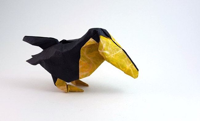 Origami Toucan by Angel Morollon Guallar. Wet folded from a square of Vu paper by Gilad Aharoni on giladorigami.com