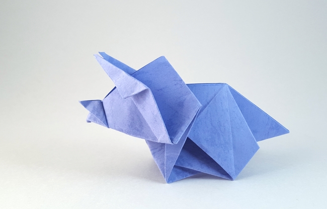 Origami Triceratops baby by Makoto Yamaguchi. Folded from a square of dinosaur origami paper by Gilad Aharoni on giladorigami.com