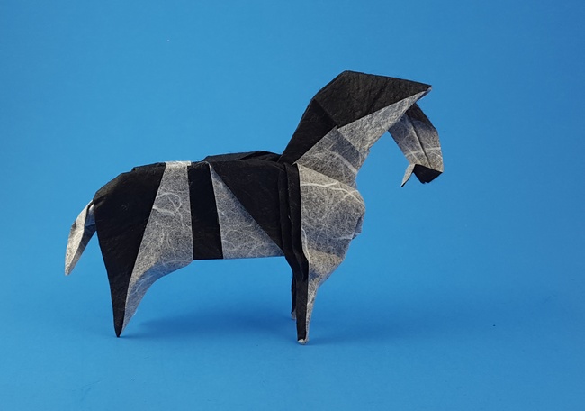 Origami Zebra by Wei Lin Chen. Folded from a square of Duo Thai paper by Gilad Aharoni on giladorigami.com